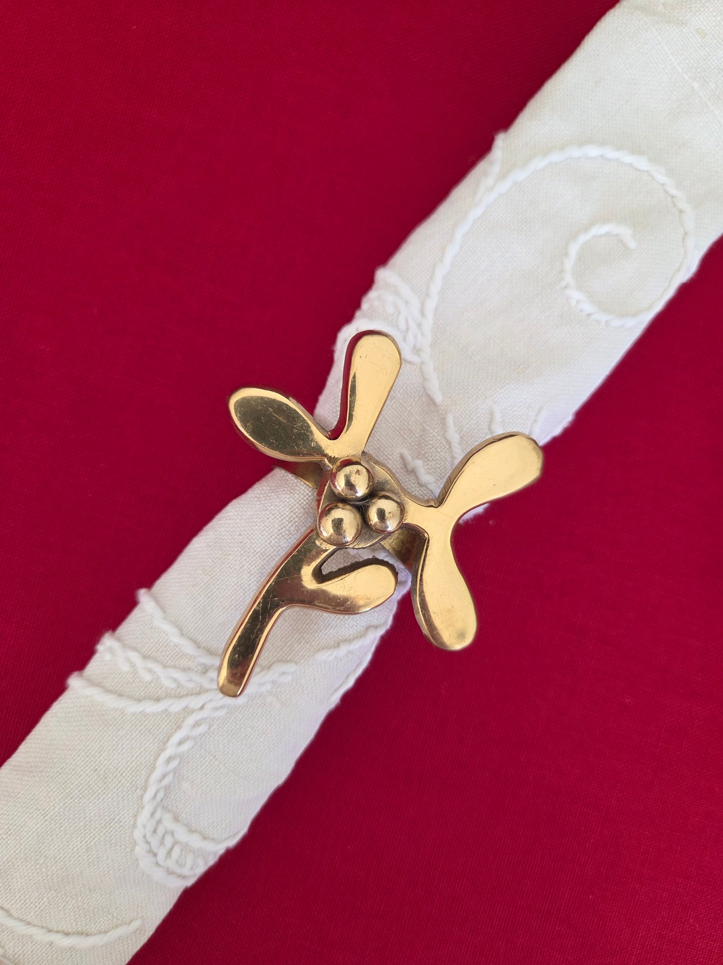 A Pair of Brass Mistletoe Napkin Rings