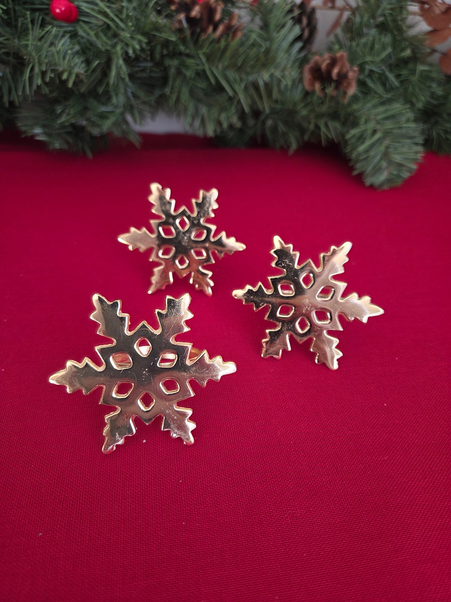 Set of Three Brass Snowflake Napkin Rings