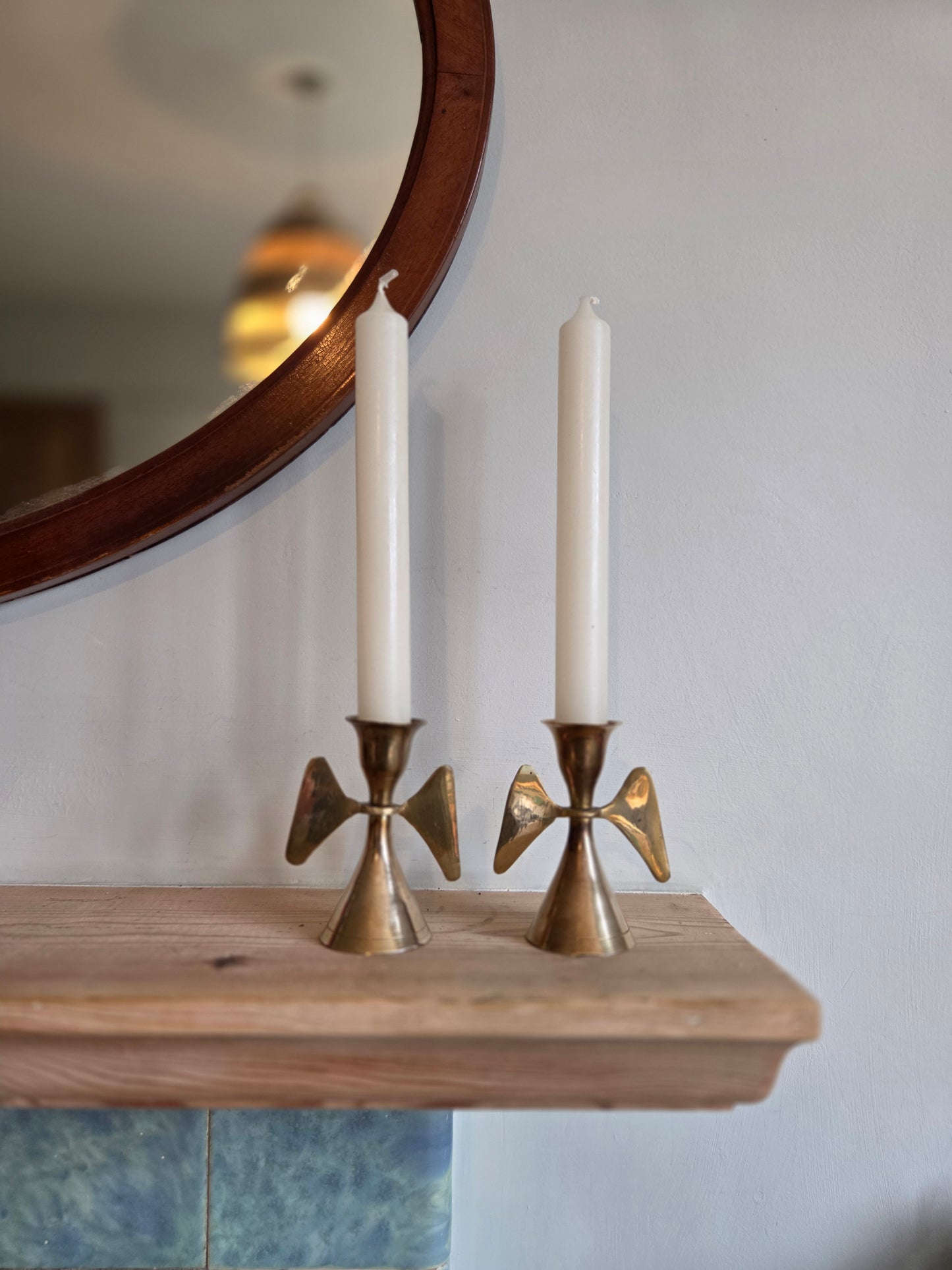 Pair of Brass Angel Wing Candlesticks