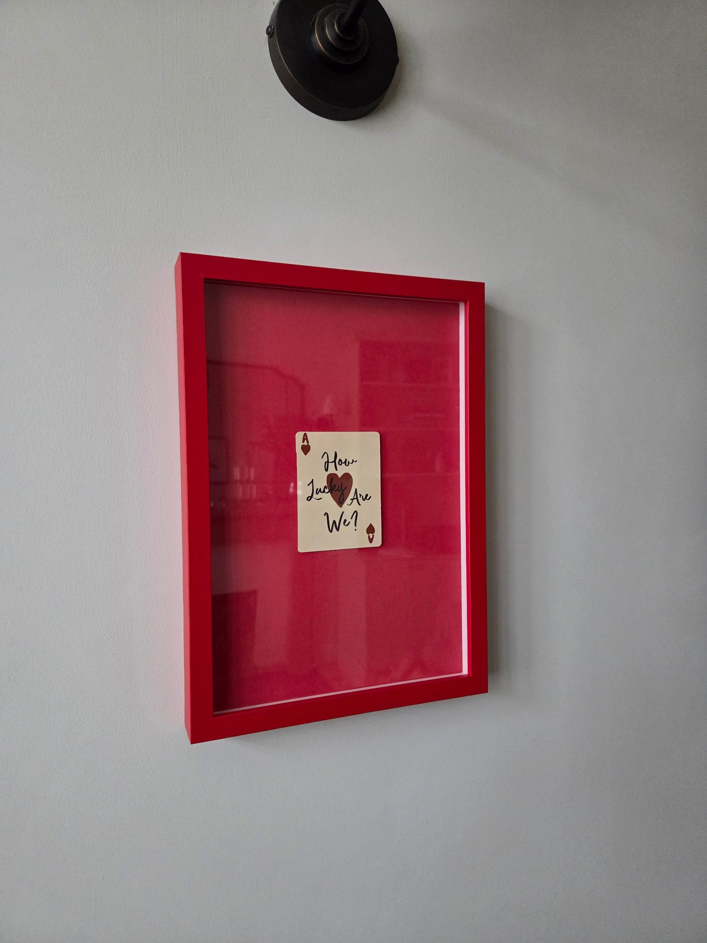 FRAMED How Lucky Are We? Playing Card Art Print - Red Frame