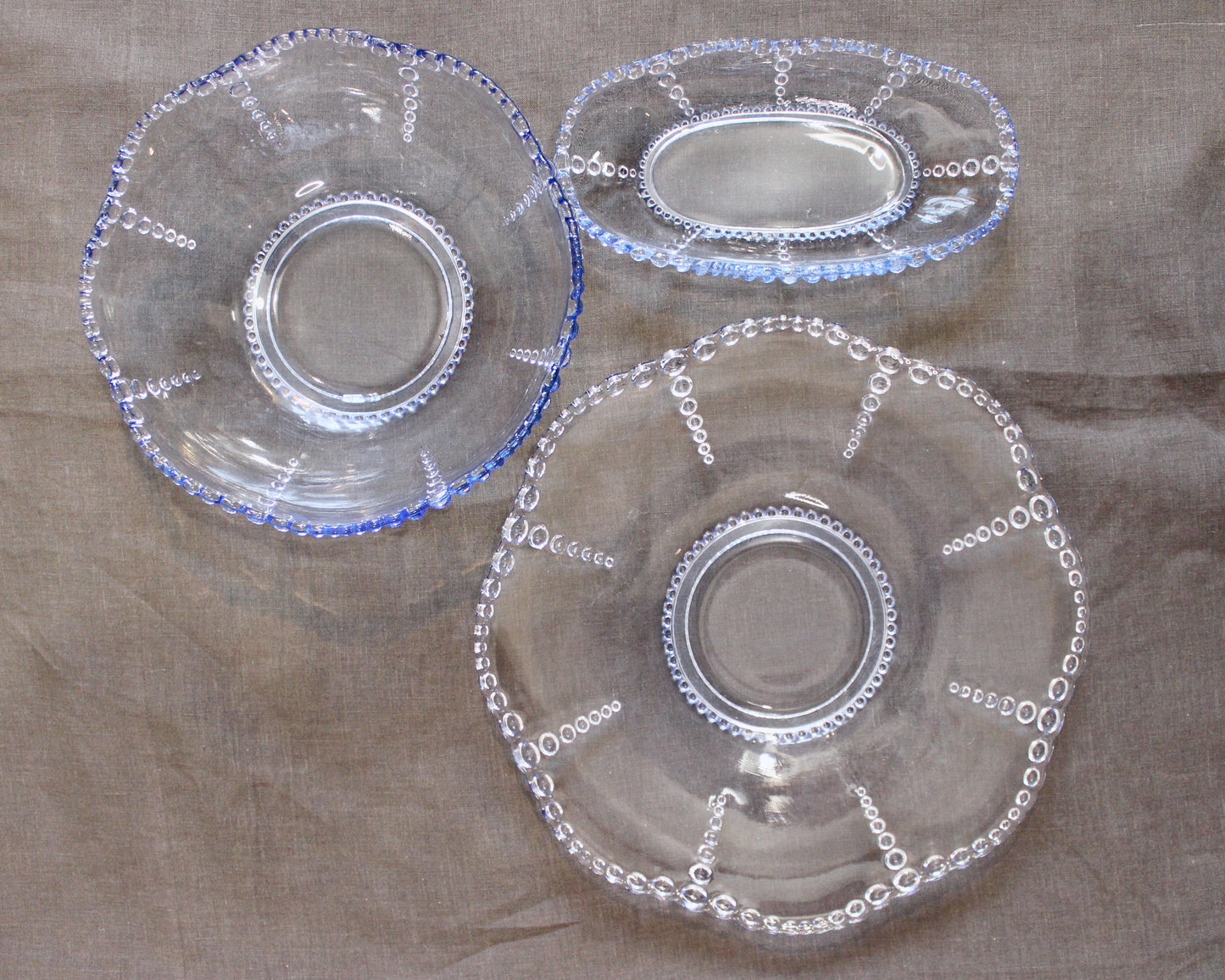 A Set of Blue Beaded Edge Serveware