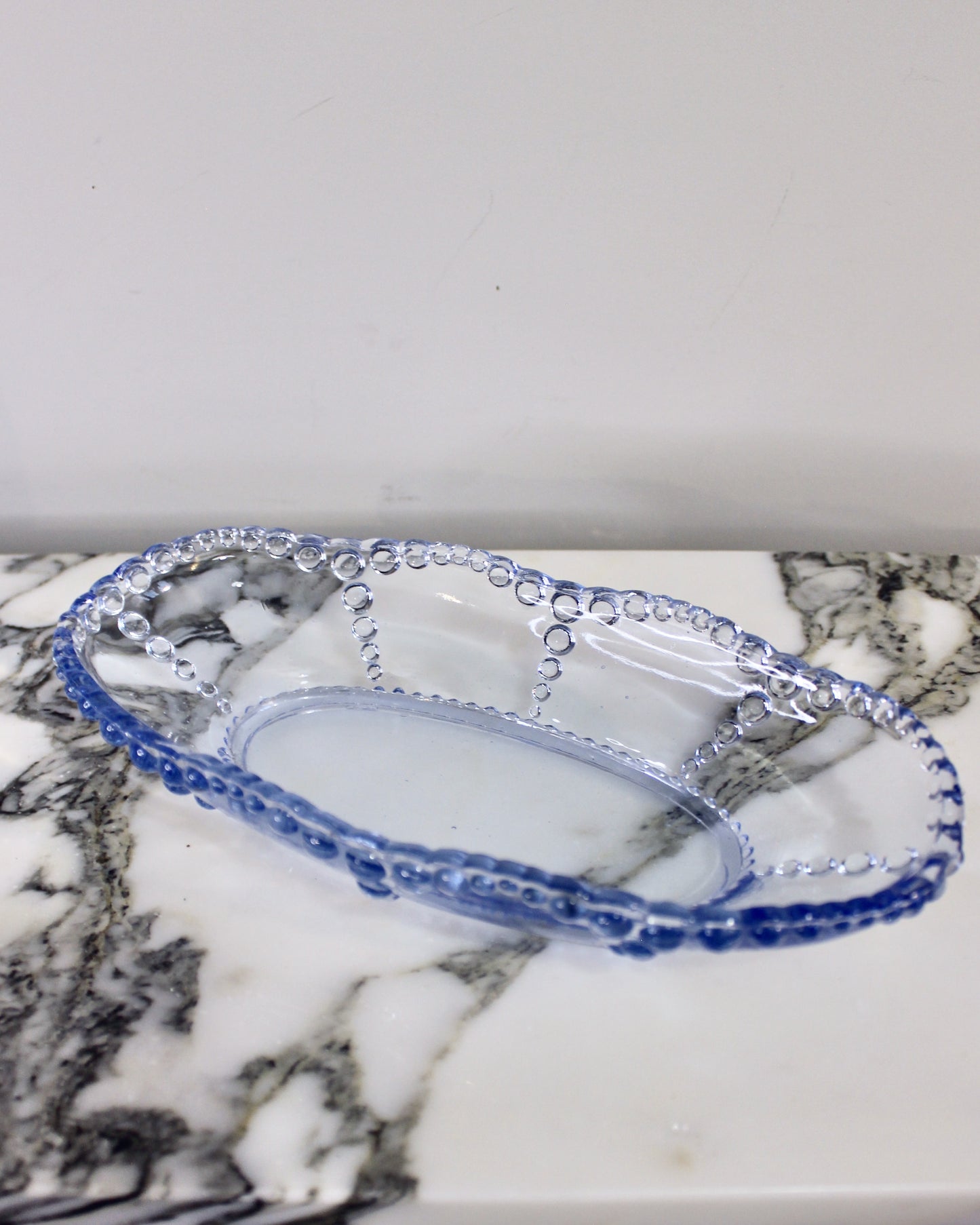 A Set of Blue Beaded Edge Serveware