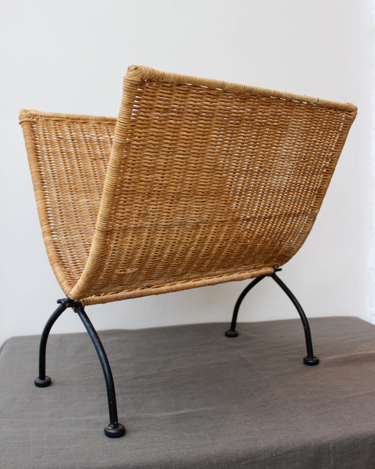 Wicker Woven and Cast Iron Magazine rack or Log Store