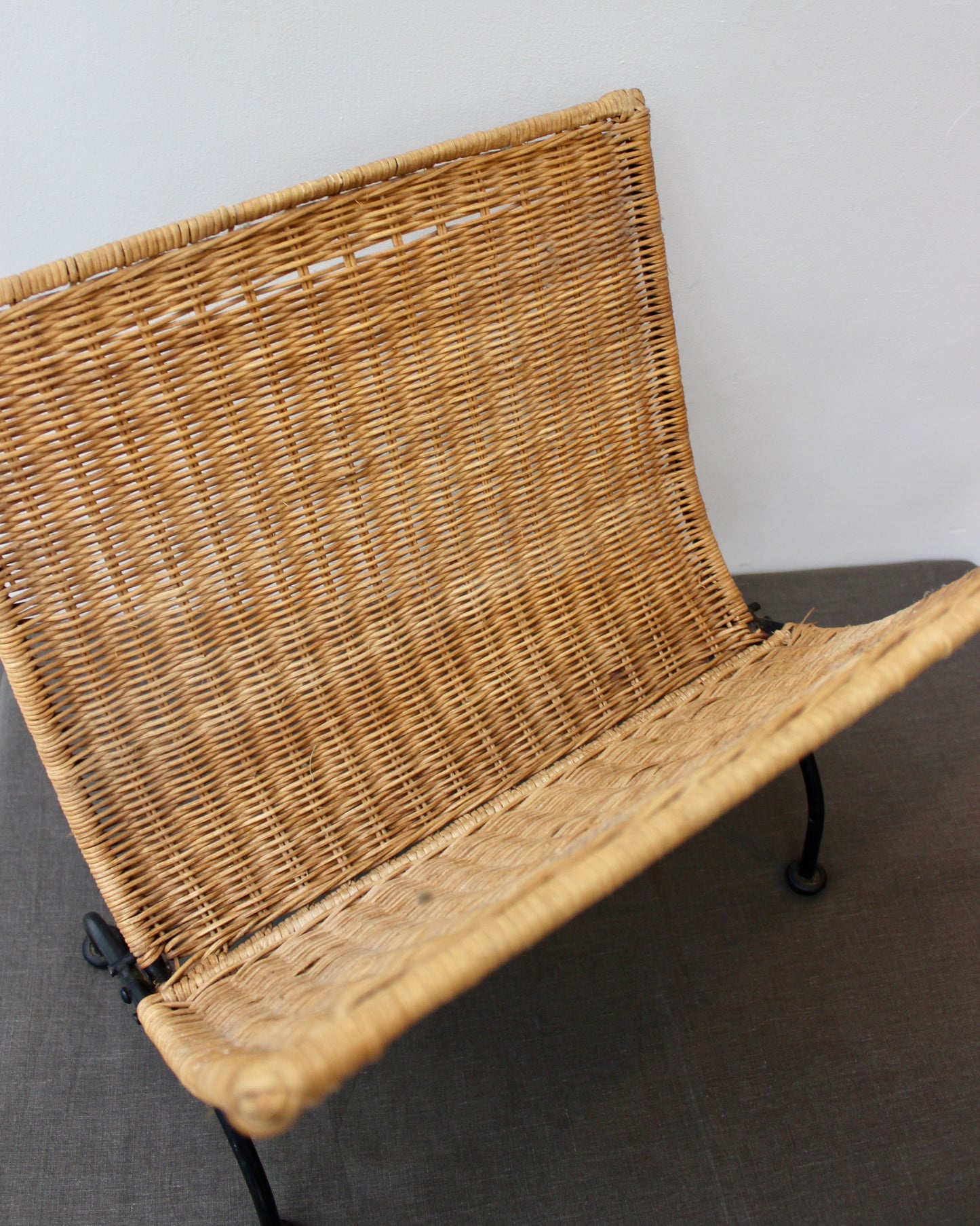 Wicker Woven and Cast Iron Magazine rack or Log Store