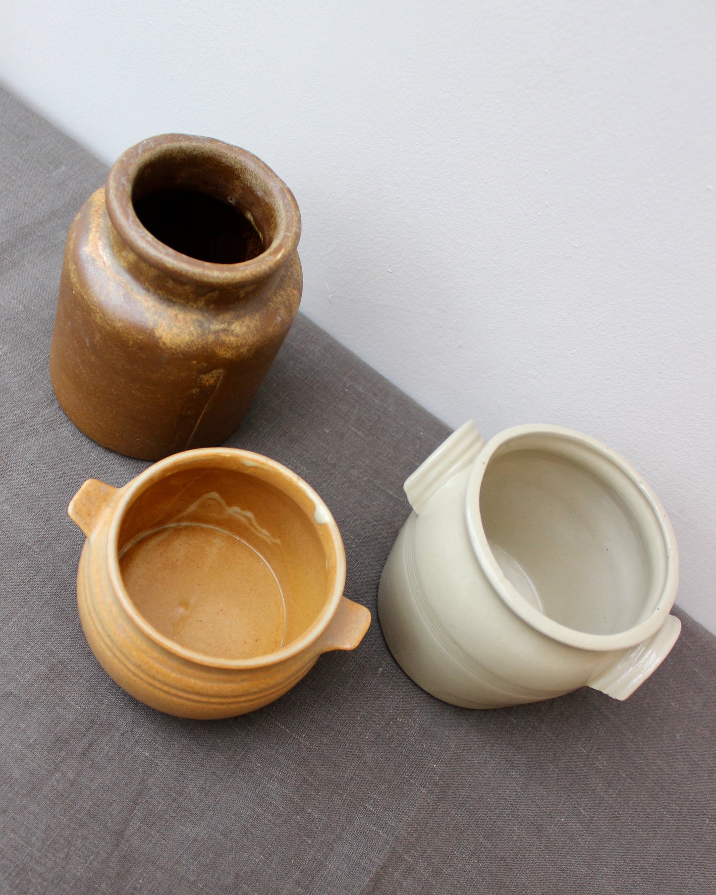 A Trio of Stoneware Pots