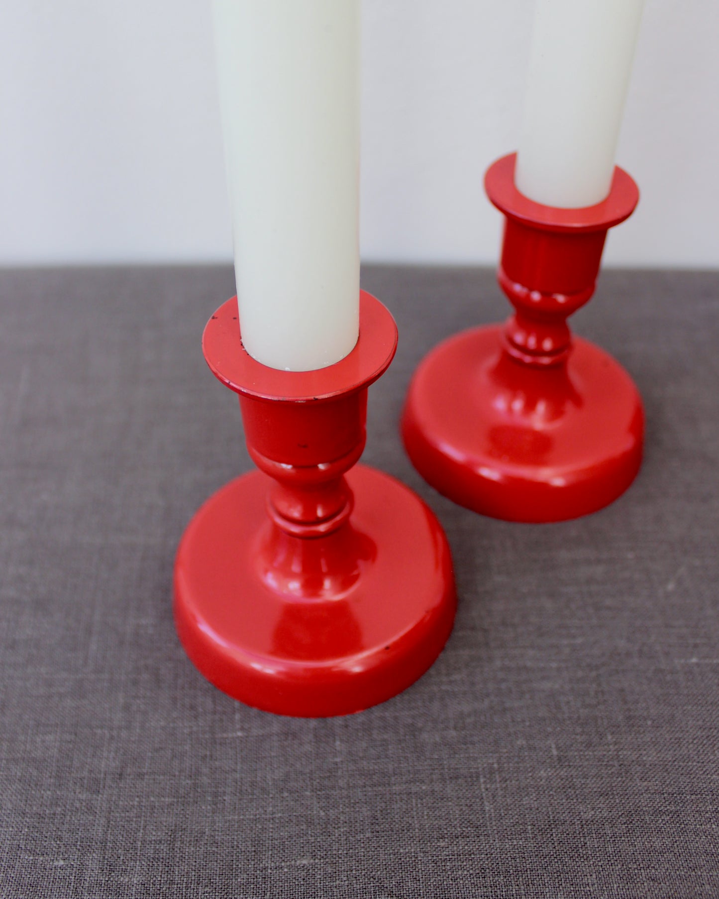 Pair of Red Enamel Candlesticks