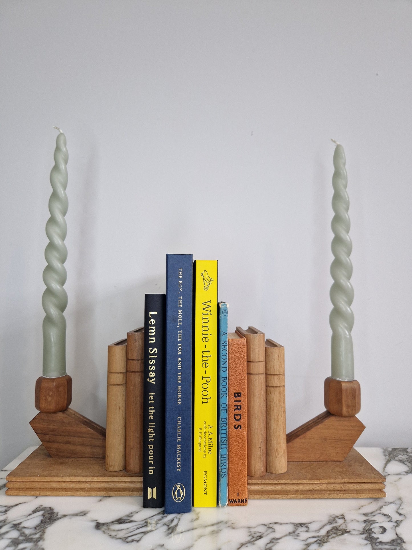 A Pair of Oak Book Ends with Candle Holders