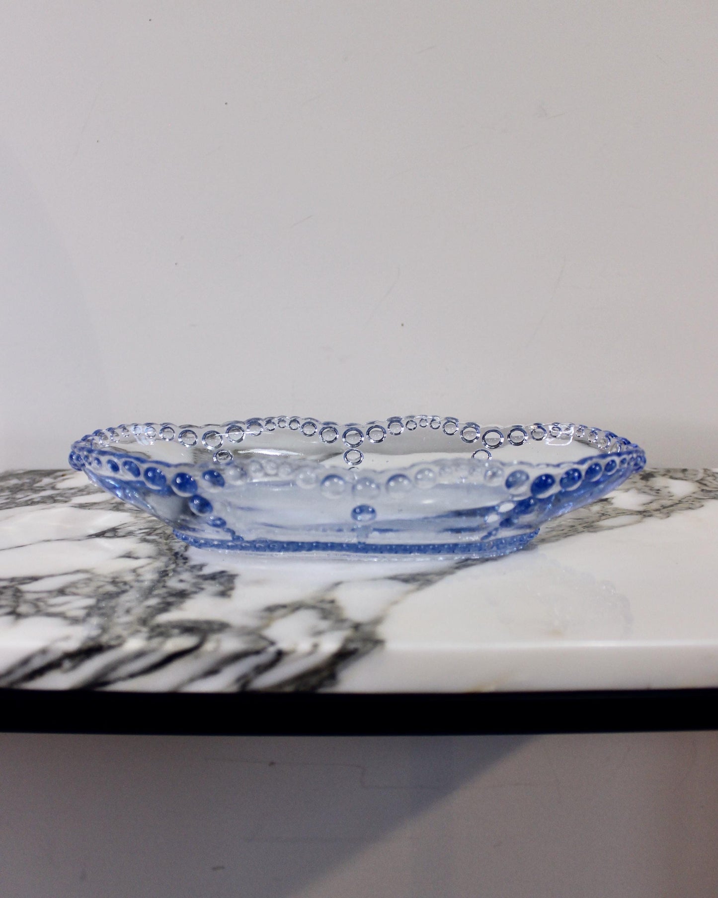 A Set of Blue Beaded Edge Serveware
