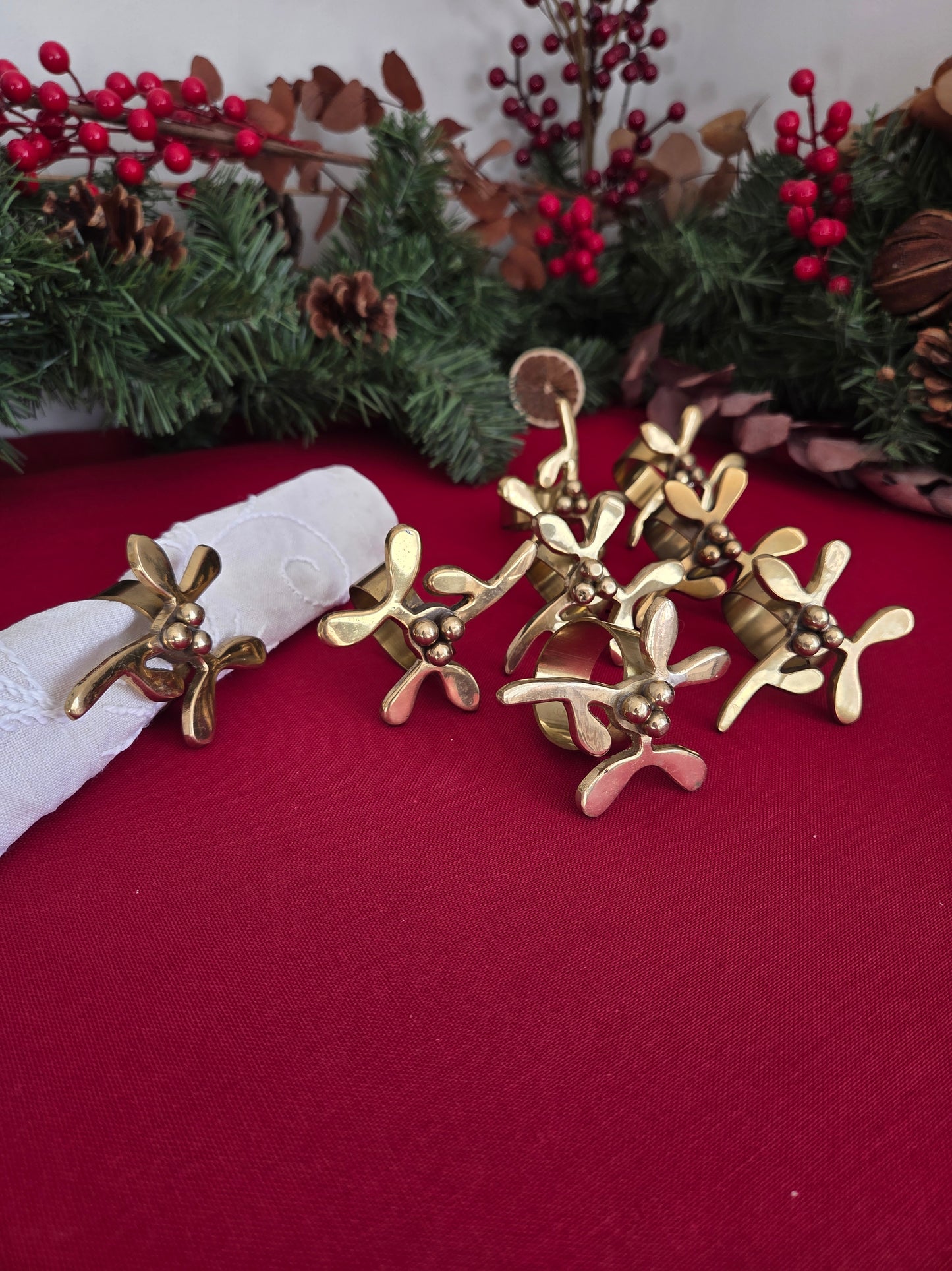 Set of Eight Brass Mistletoe Napkin Rings