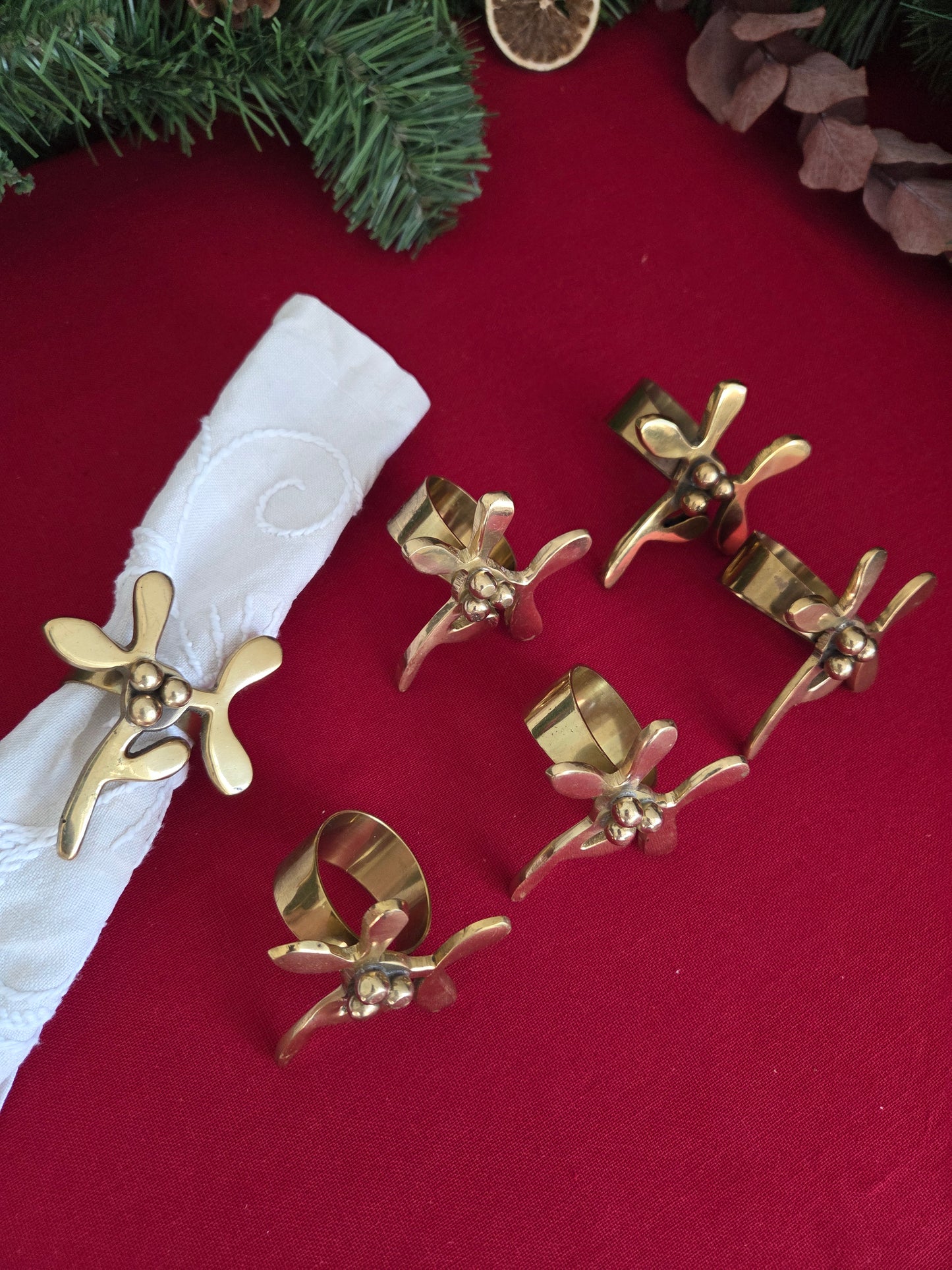 Set of Six Brass Mistletoe Napkin Rings