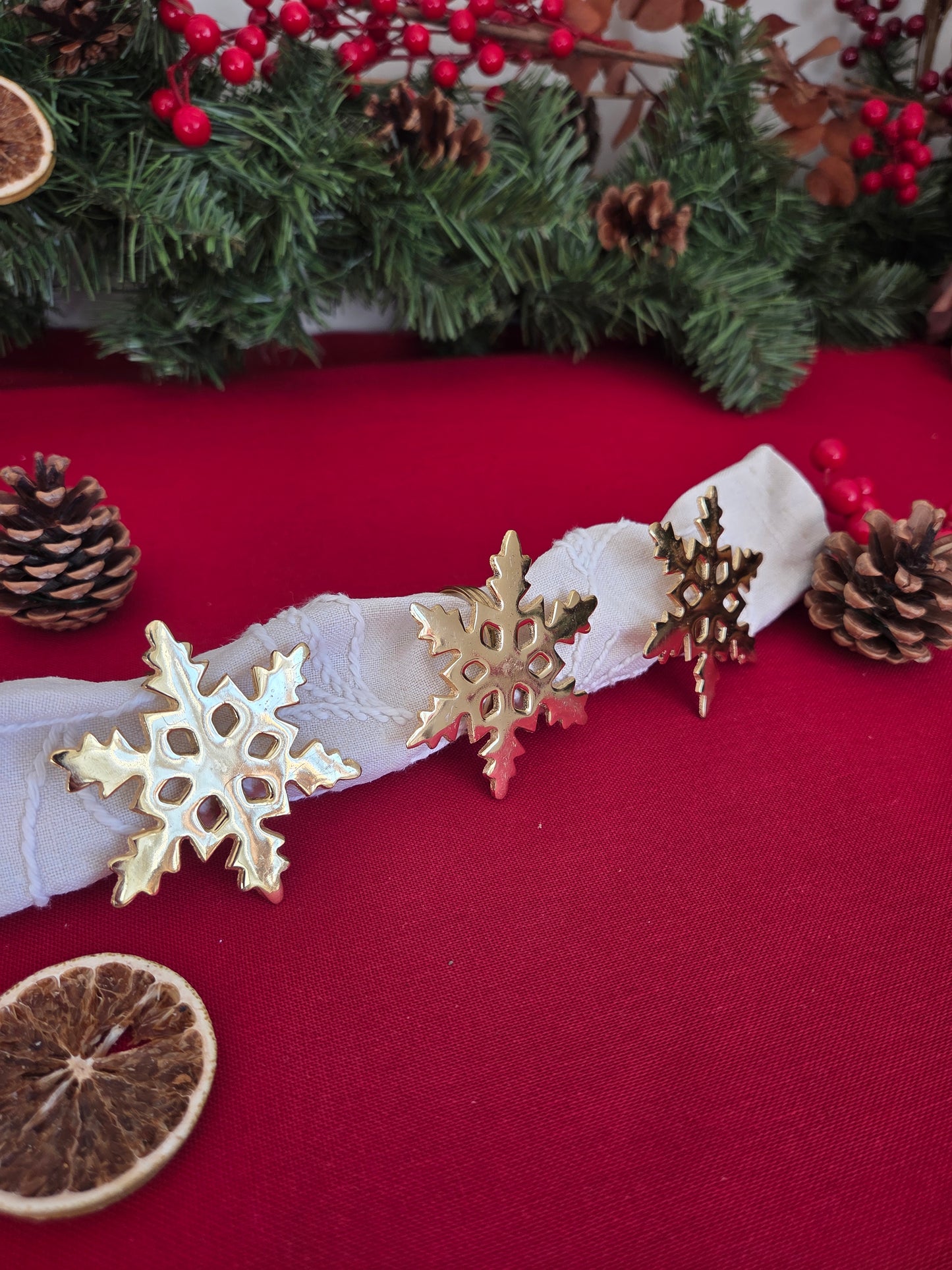 Set of Three Brass Snowflake Napkin Rings