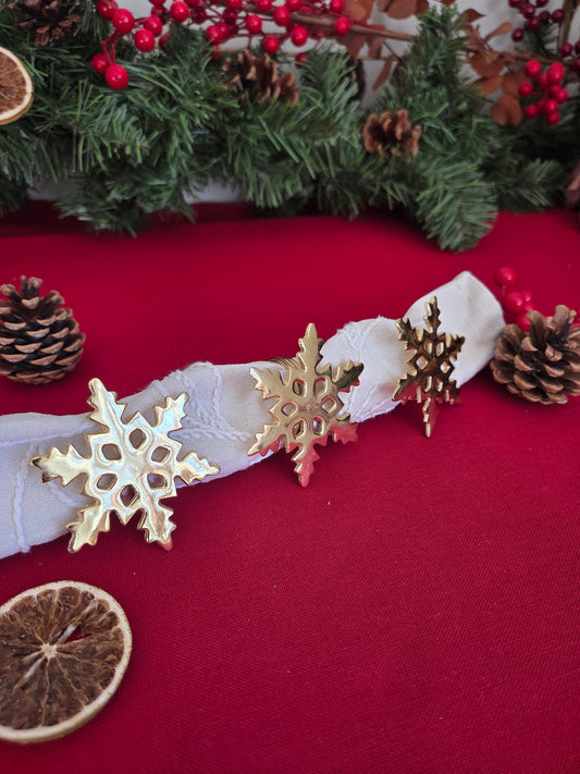 Set of Three Brass Snowflake Napkin Rings