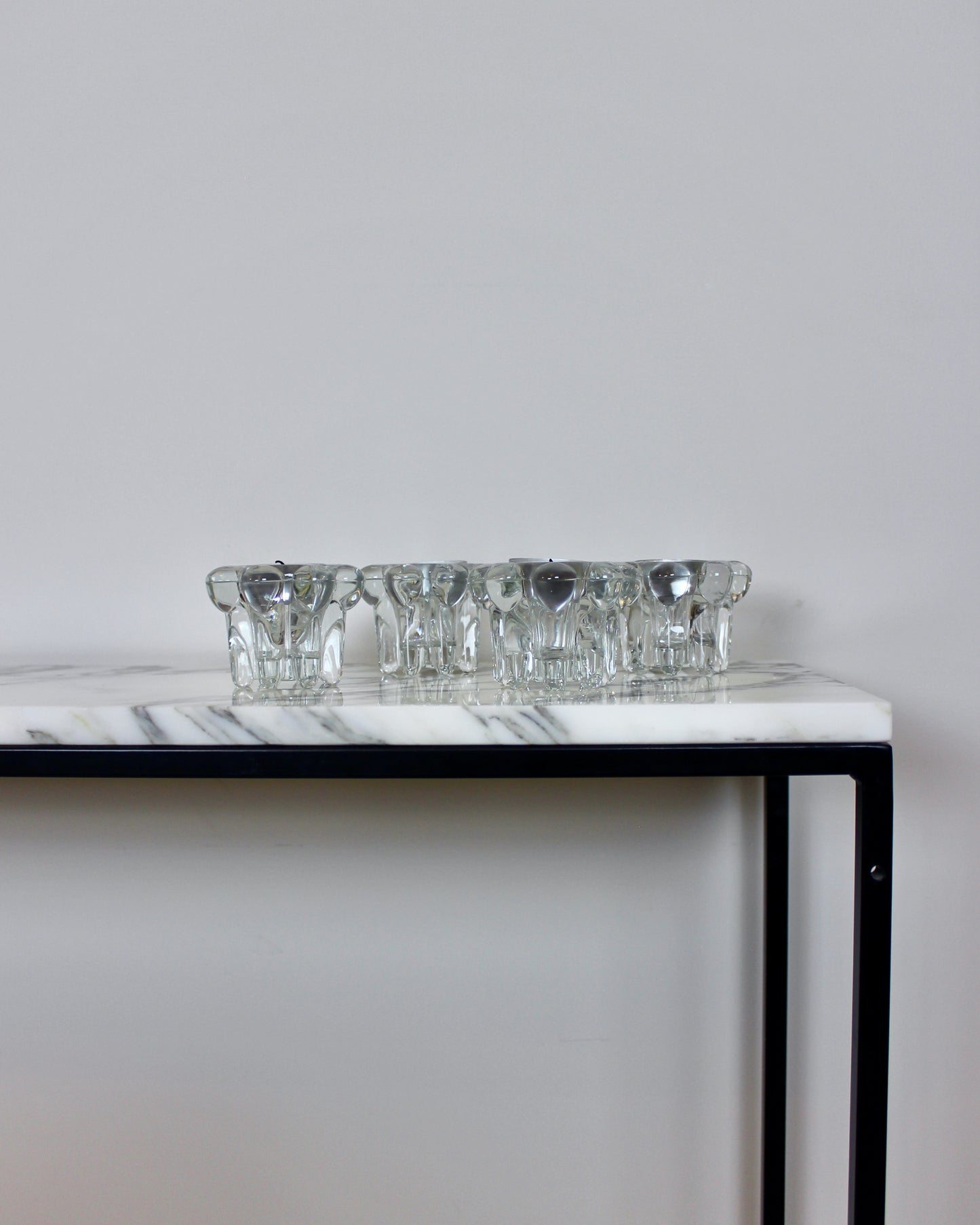 A Set of 4 Glass Candle Holders