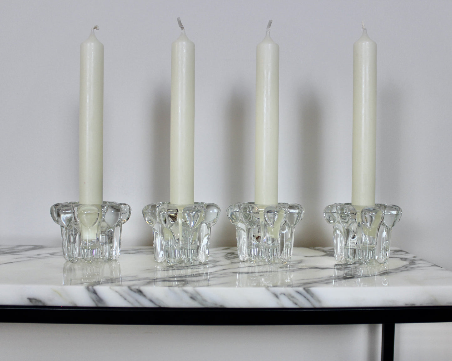 A Set of 4 Glass Candle Holders