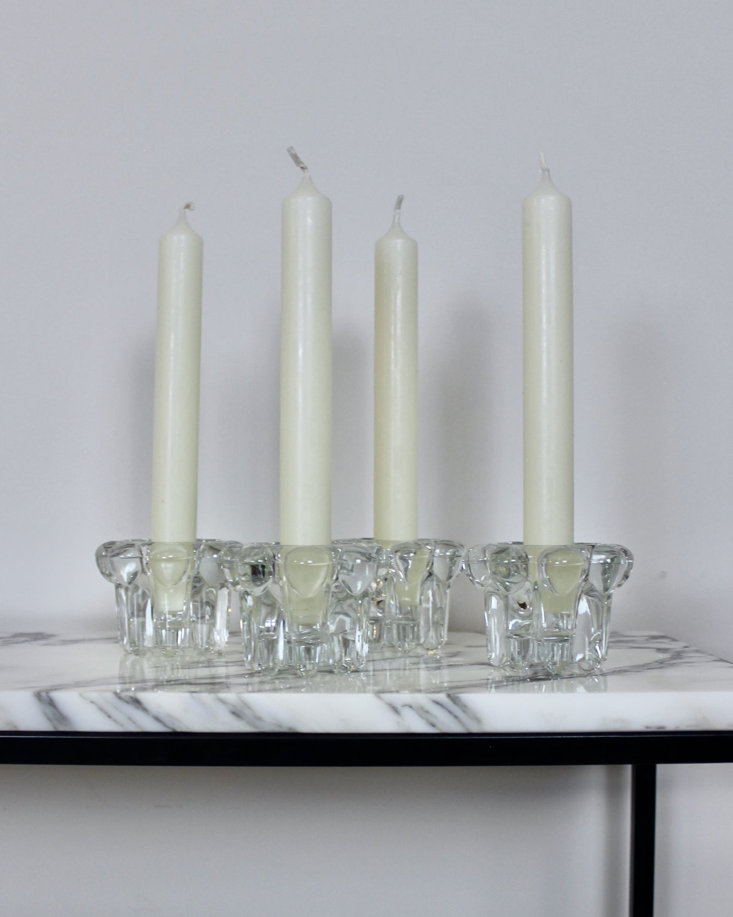 A Set of 4 Glass Candle Holders