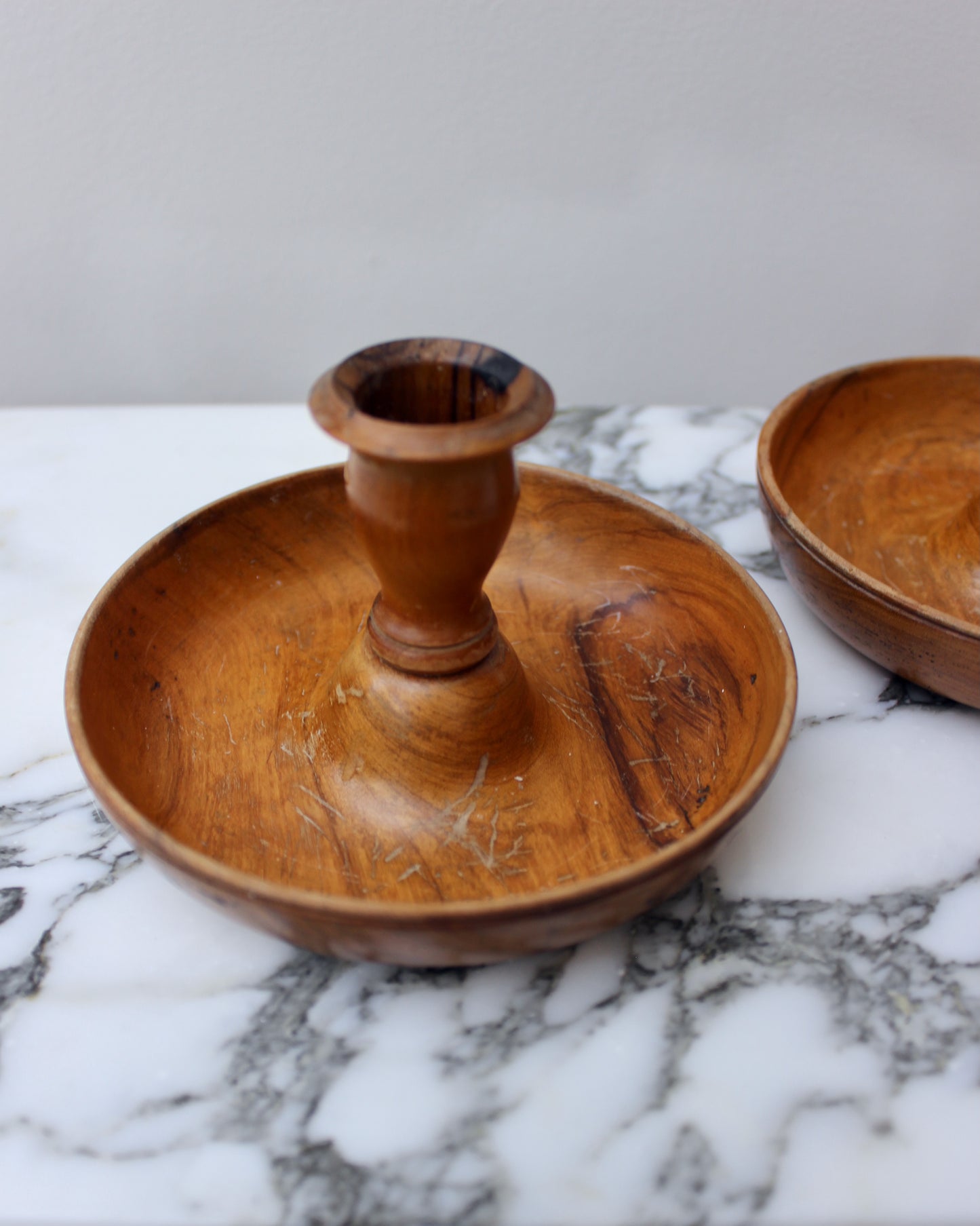 A Pair of Wood Turned Candlesticks