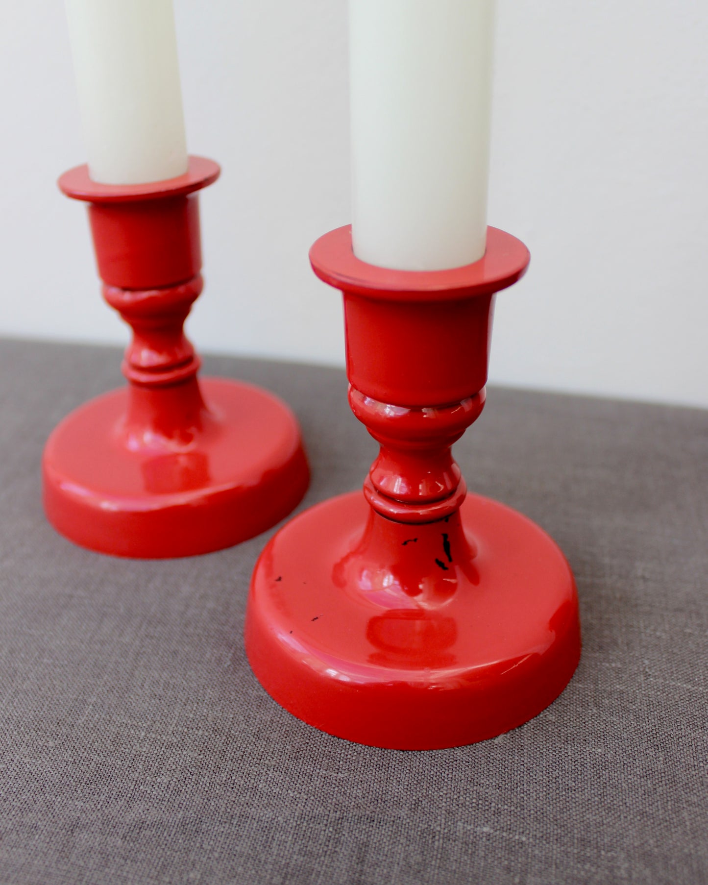 Pair of Red Enamel Candlesticks