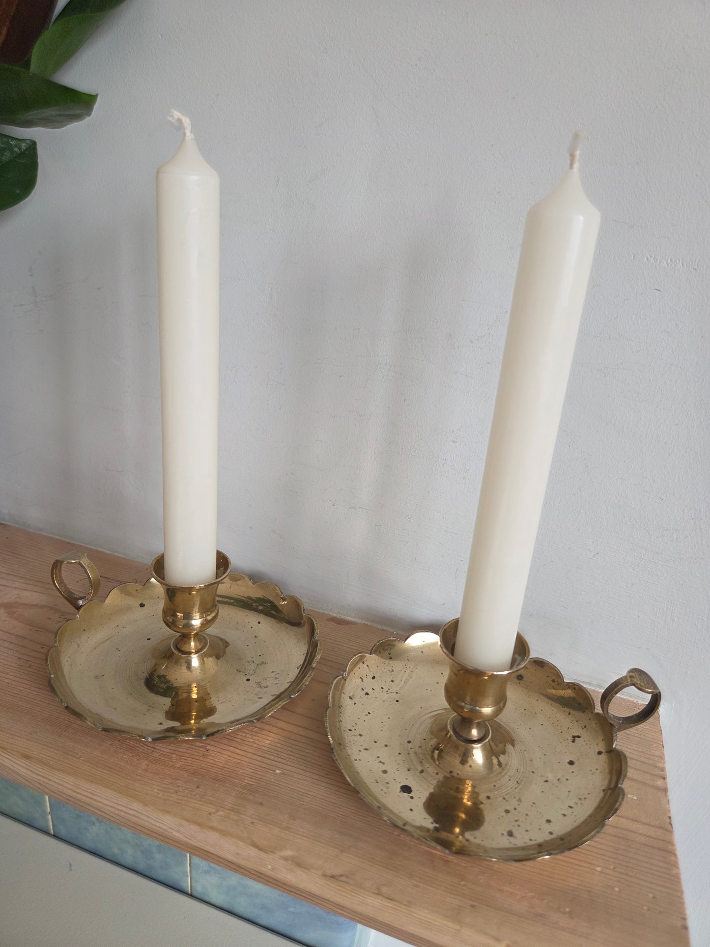 A Pair of Scallop Brass Candlesticks