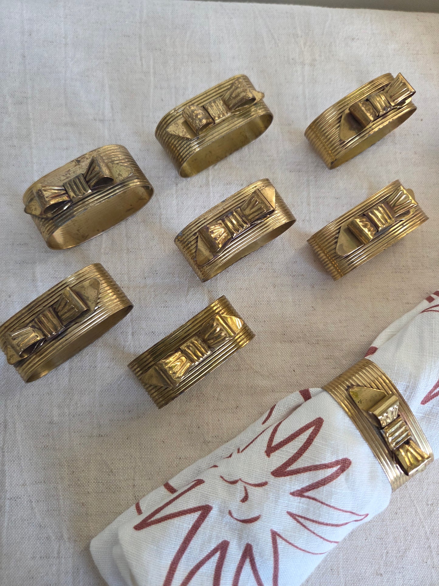 8 Brass Bows Vintage Napkin Rings