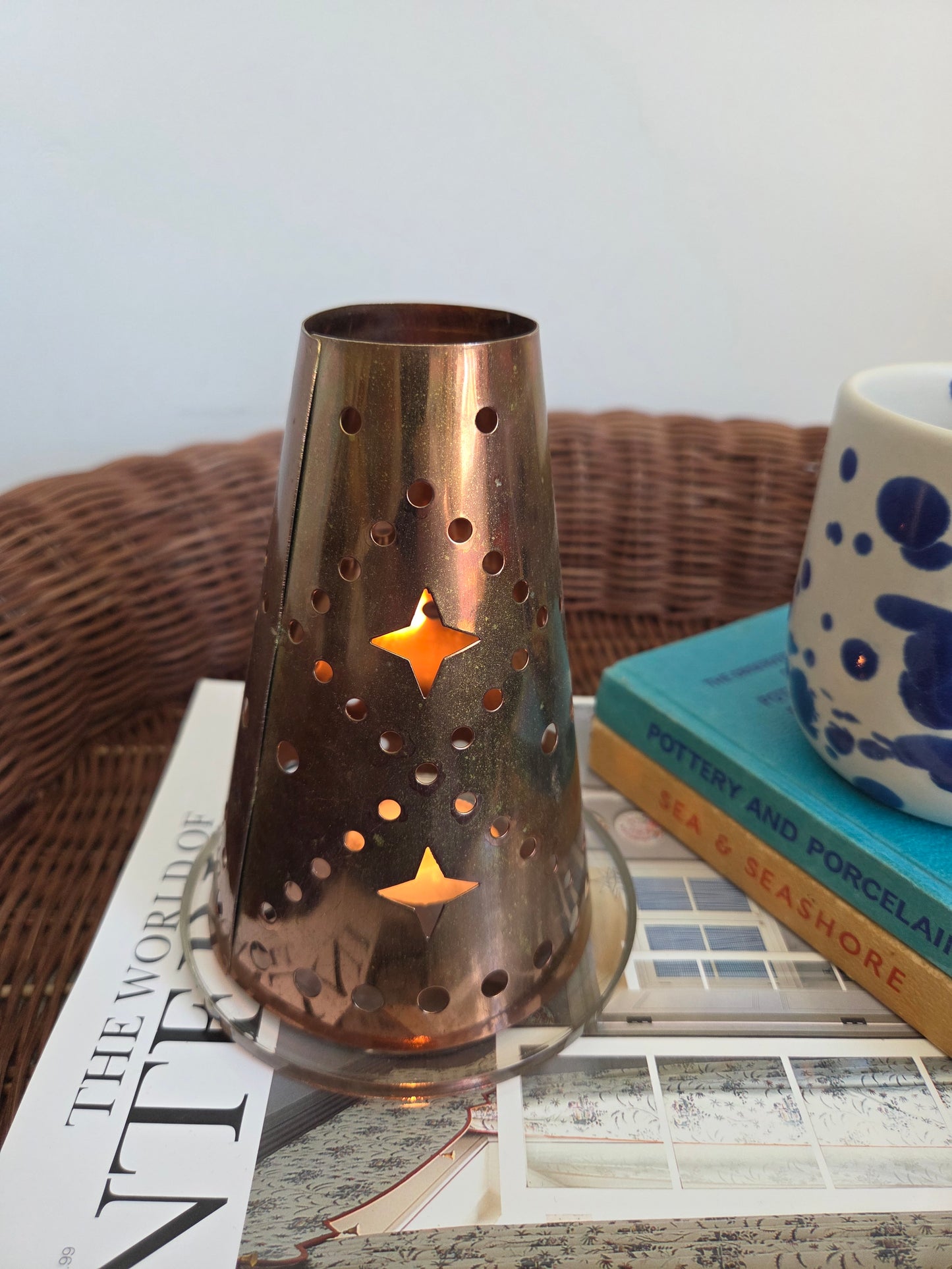 Brass Coloured Tealight Shade with Star Cutouts on Glass Candle Plate