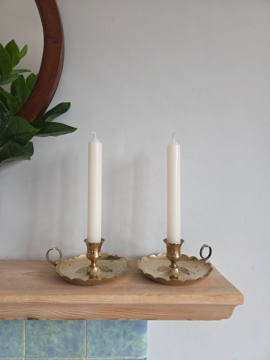 A Pair of Scallop Brass Candlesticks