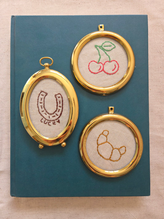 Embroideries in Vintage Brass Frames