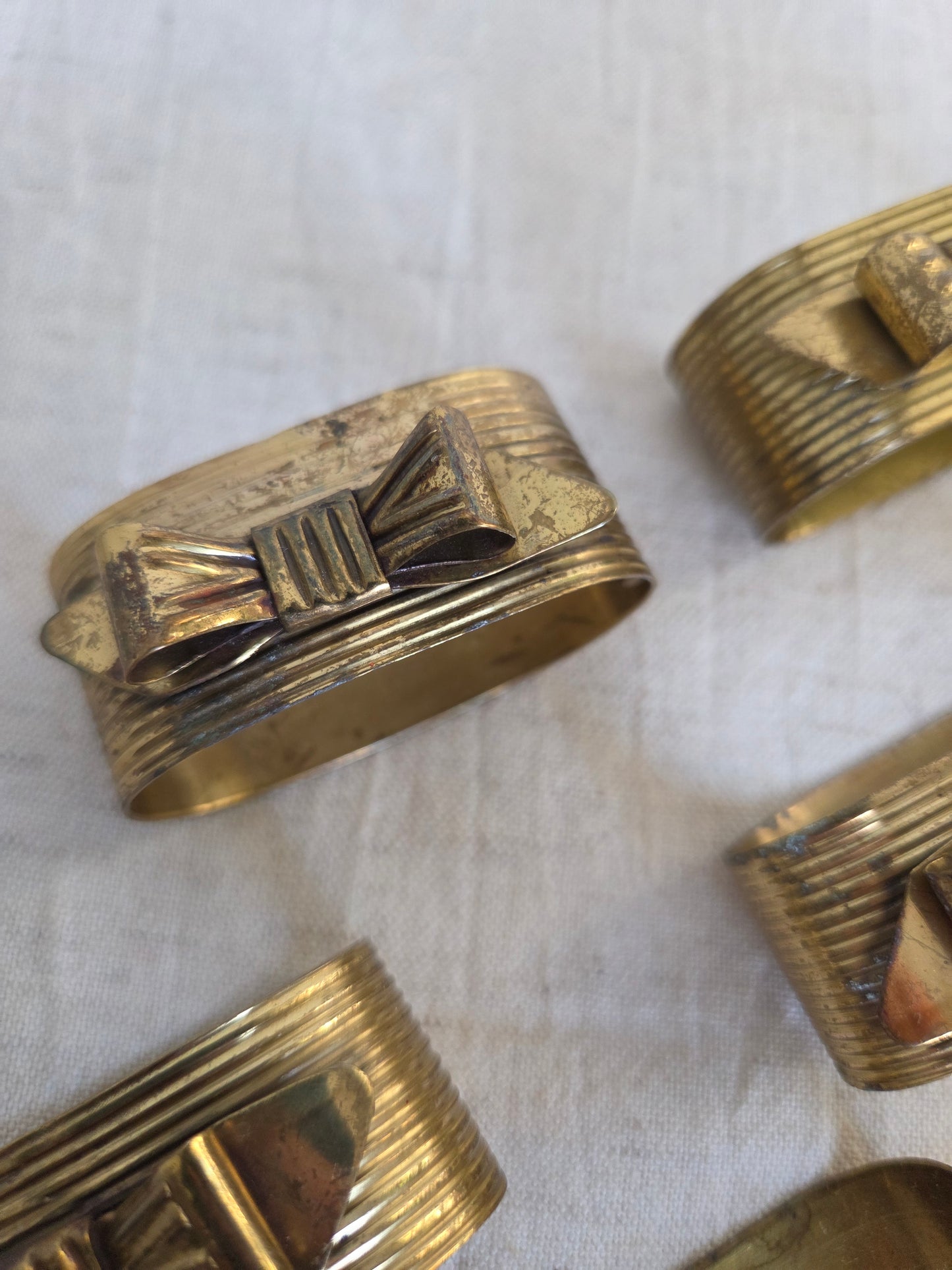 8 Brass Bows Vintage Napkin Rings