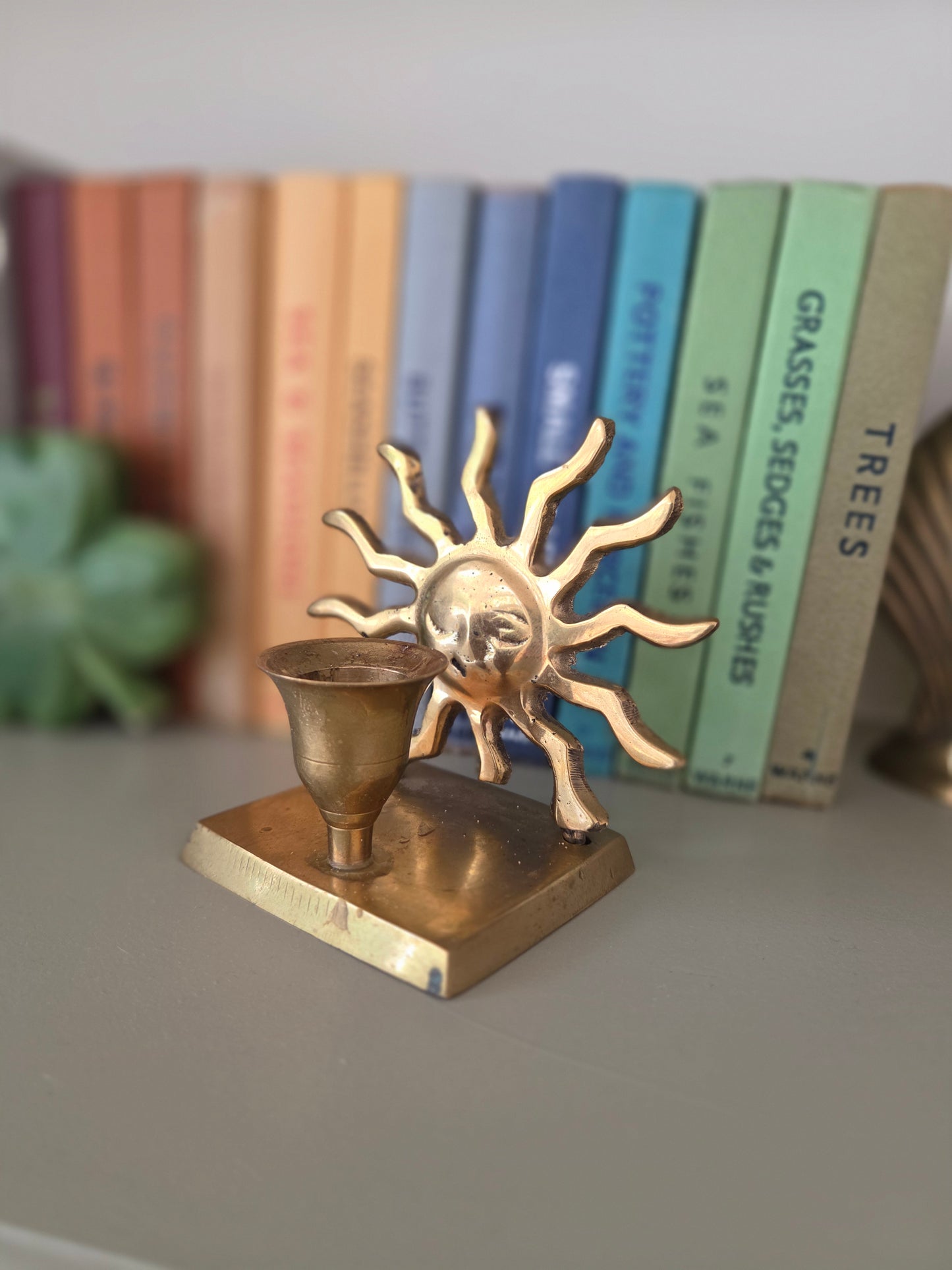 Vintage brass sun candle holder